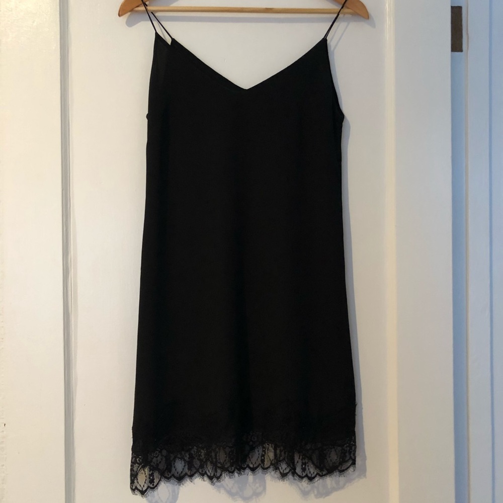 Black strappy sleeveless dress with lace trim